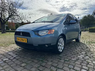 Mitsubishi Colt 5 deurs airco, lm velgen