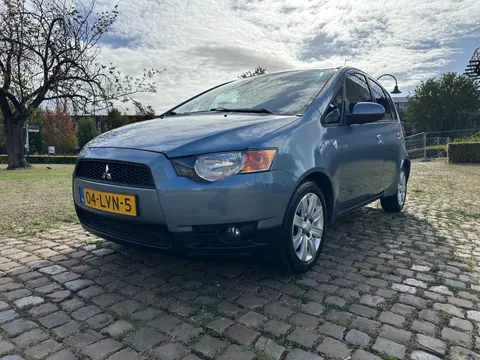 Mitsubishi Colt 5 deurs airco, lm velgen